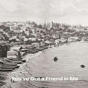 Black and white illustration of a house- and boat-lined shore on a large body of water.